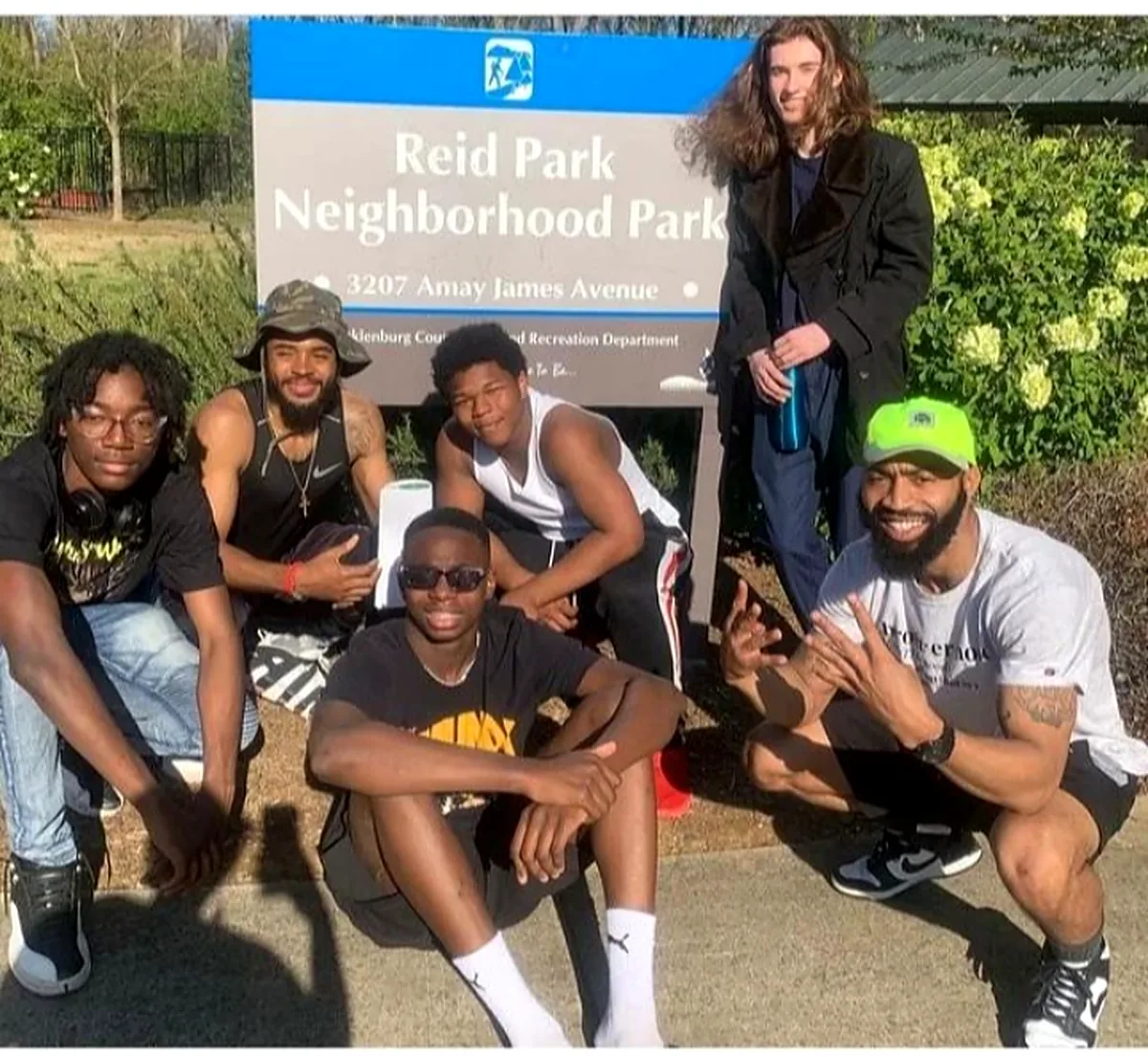 Youth group gathered at Reid Park Neighborhood Park in Charlotte